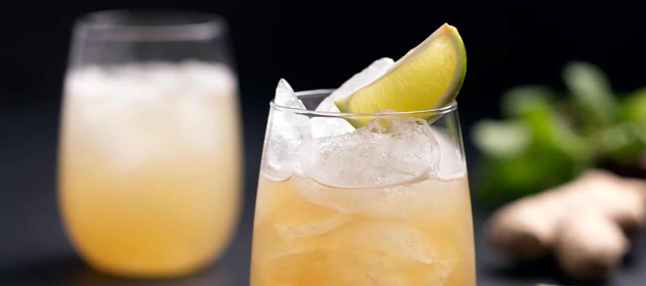 Two Alcohol-free mocktails, with ice and a lime