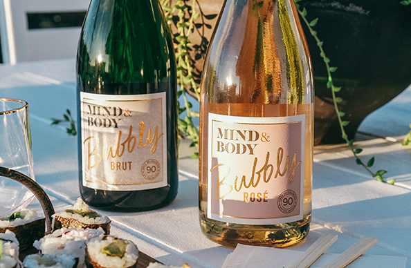 Mind & Body bubbly on a table outside