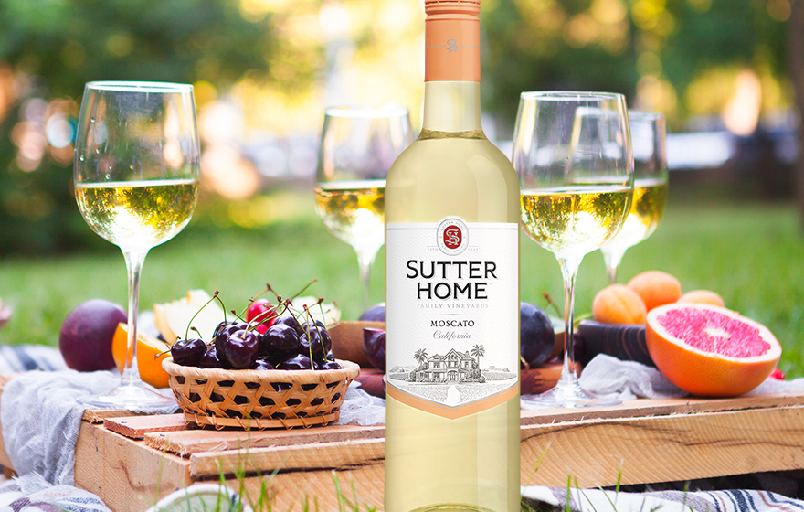 Bottle of Sutter Home Moscato at an outdoor picnic