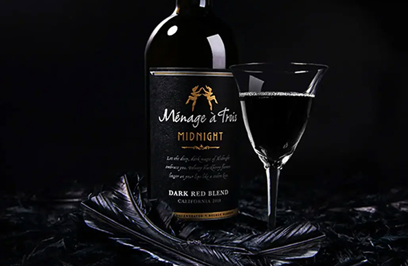 Black raven wine cocktail made with Menage a Trois midnight dark red blend wine