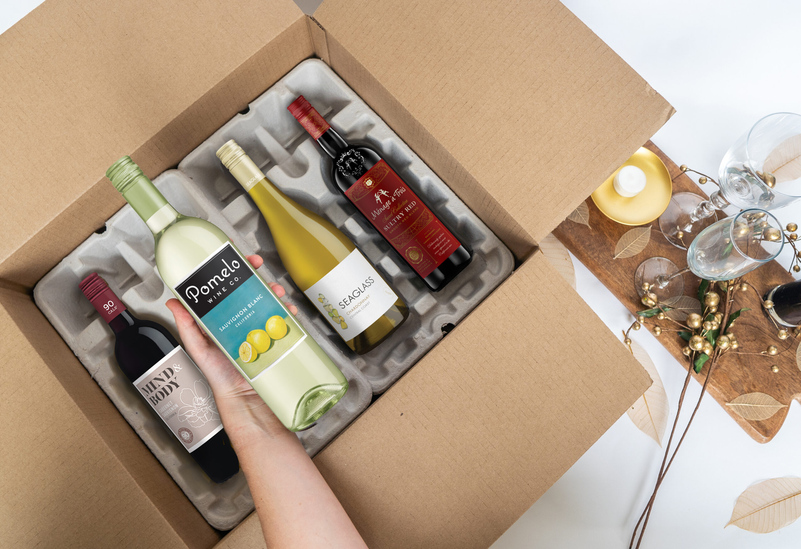 person unboxing everyday wine club shipment from One Stop Wine Shop