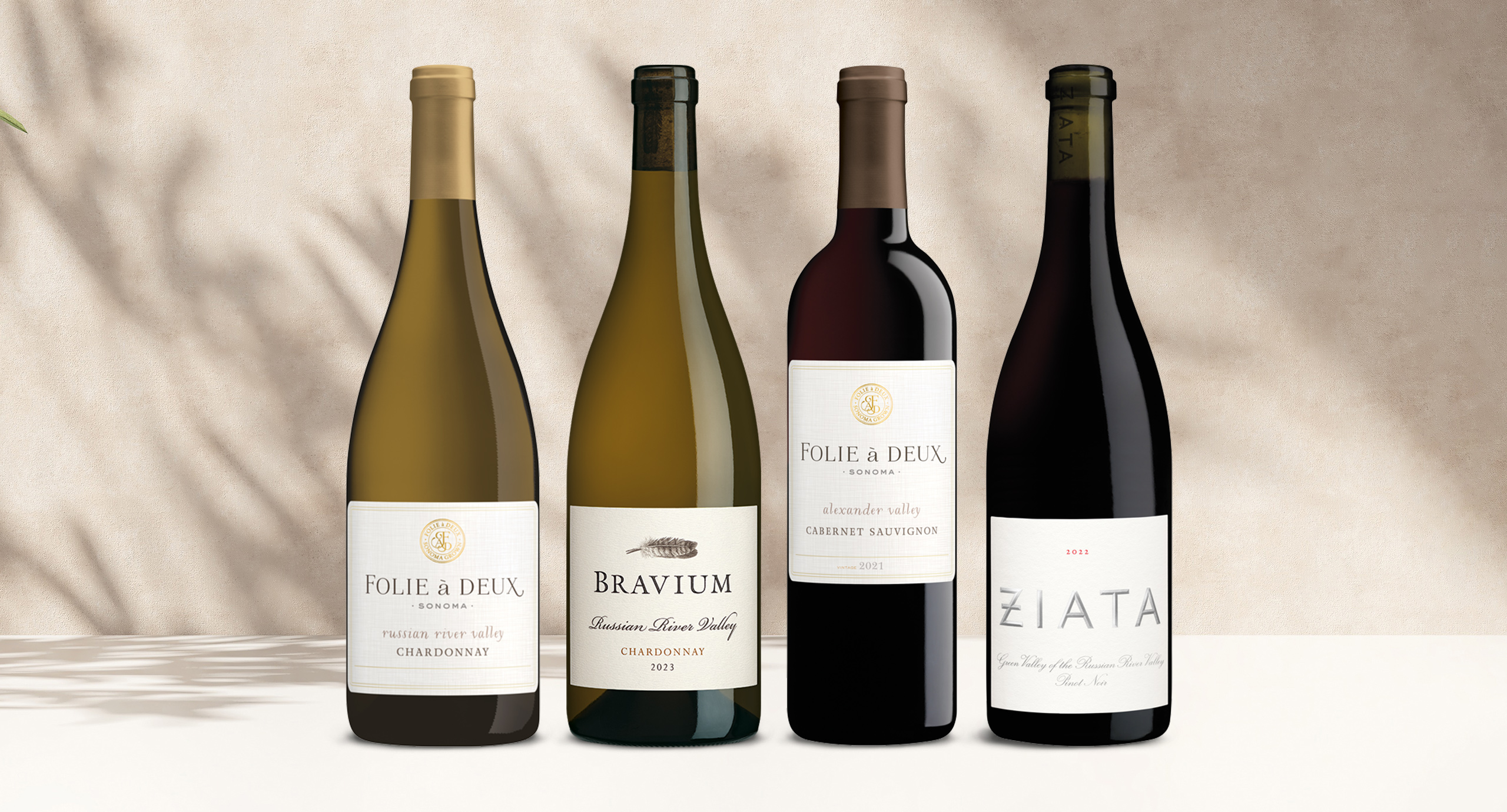 One Stop Wine Shop's Quintessential Wine Club September shipment featuring Folie a Deux chardonnay, Bravium chardonnay, Folie a Deux cabernet sauvignon, and ZIATA Russian River Valley pinot noir. Sign up for our wine club!