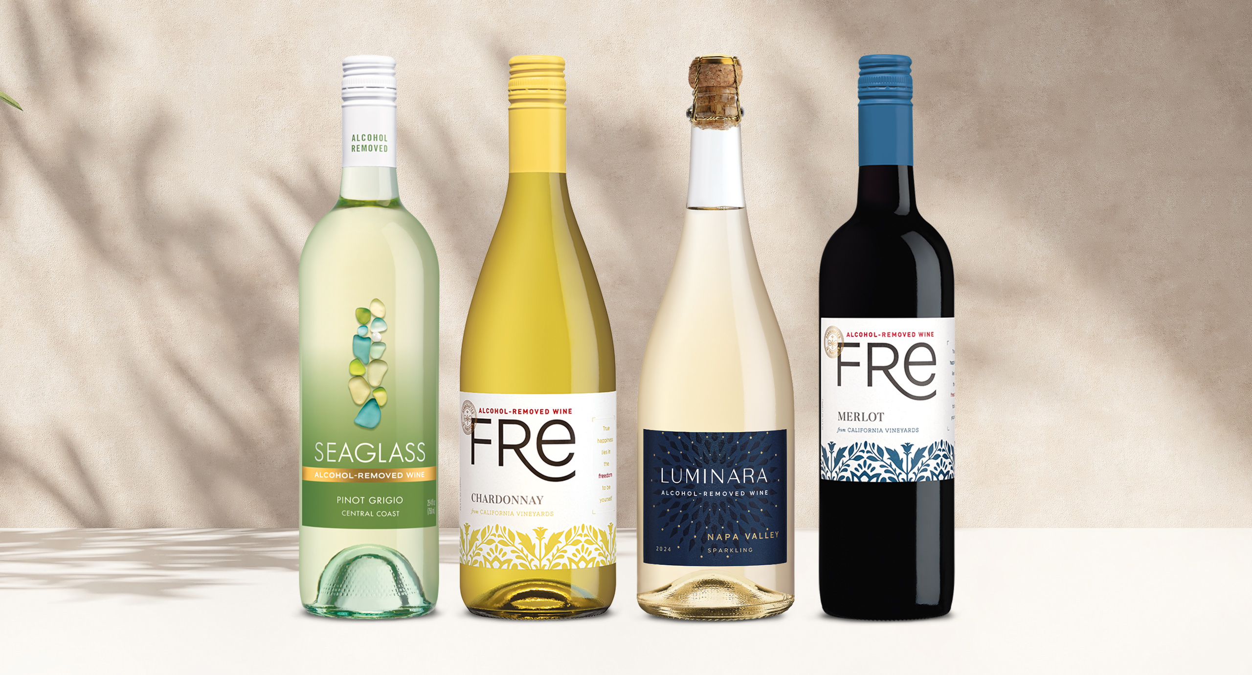 One Stop Wine Shop's Alcohol Removed wine club February shipment featuring SEAGLASS pinot grigio, FRE chardonnay, Luminara sparkling, and FRE merlot. Sign up for our wine club!
